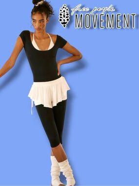 FP Movement Epic Plie Cropped Onesie in Black. Size S/P